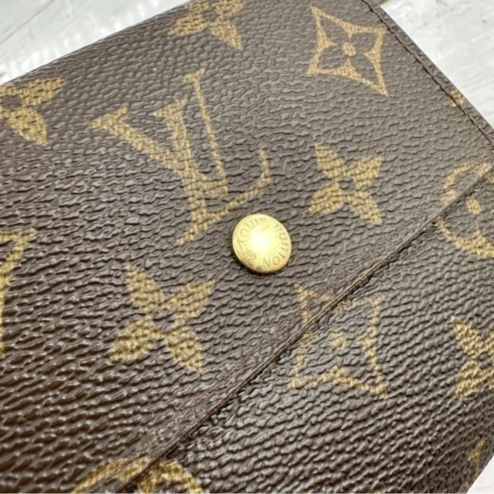 AUTHENTIC Louis Vuitton Elise compact wallet. Monogram canvas.